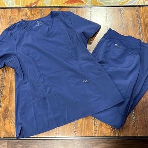 Cherokee infinity scrubs in navy top is large bottoms are large